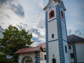 The venue is located next to the church of st. Urha in the village center